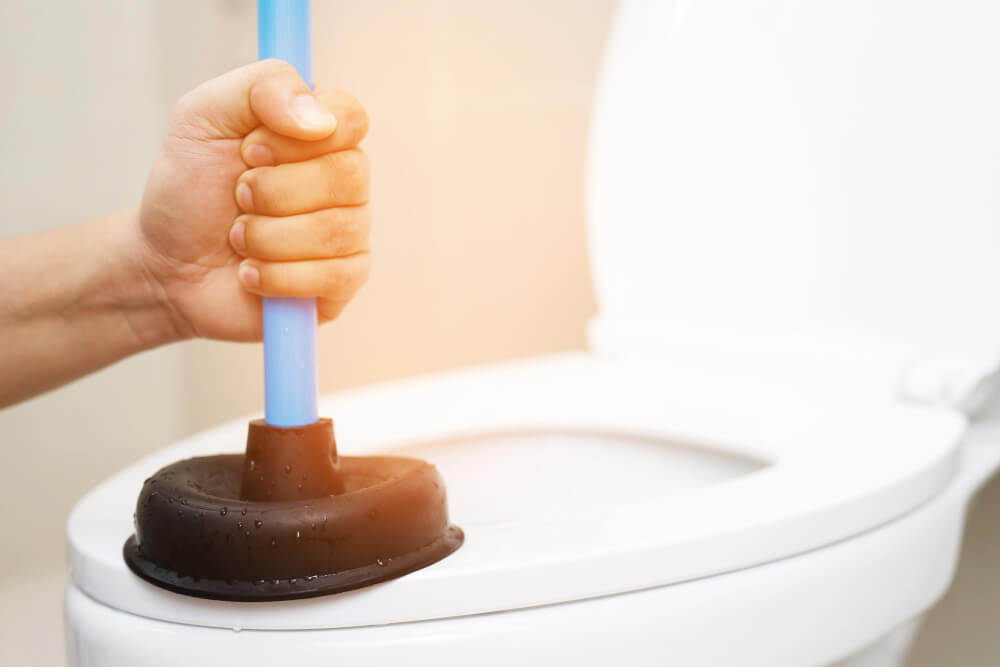 How to Unblock a Toilet with a Plunger